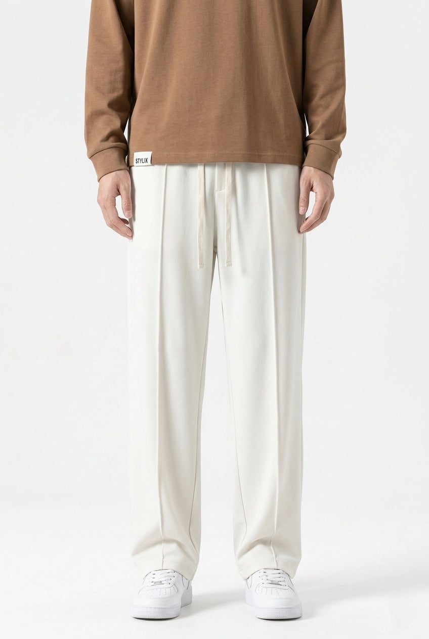 White Men's Wide-Leg Sports Trousers | Relaxed-Fit Performance Pants | Contemporary Athletic Track Pants | Versatile Activewear Bottoms | Streamlined Fitness Trousers